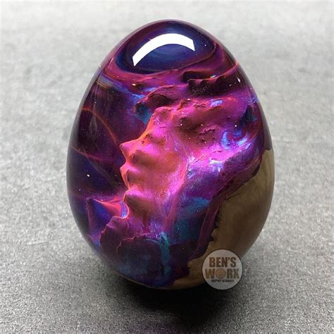 Shimmering Dragon Eggs Reveal Faraway Landscapes Within Resin And