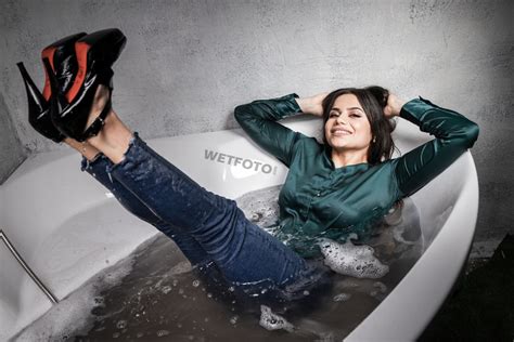 Beautiful Girl Takes A Bath In Clothes Wetfoto Com