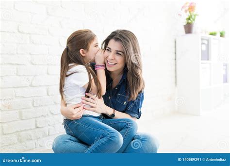 Sharing Secret With Her Mom Stock Image Image Of Adult Whispering 140589291