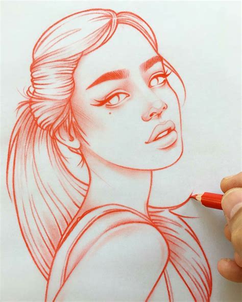 A Drawing Of A Woman S Face In Red Pencil