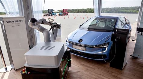 Volkswagens Mobile Robot Automatically Plugs In Your Ev Electric Car