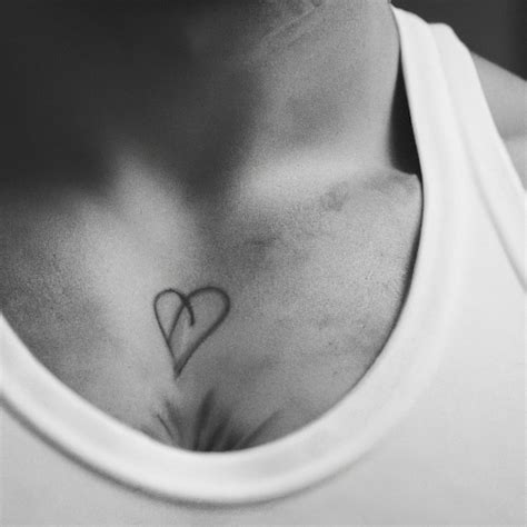 Discover The Best Tattoo Of Heart On Chest For Men Ideas Get Inspired With The Most Popular