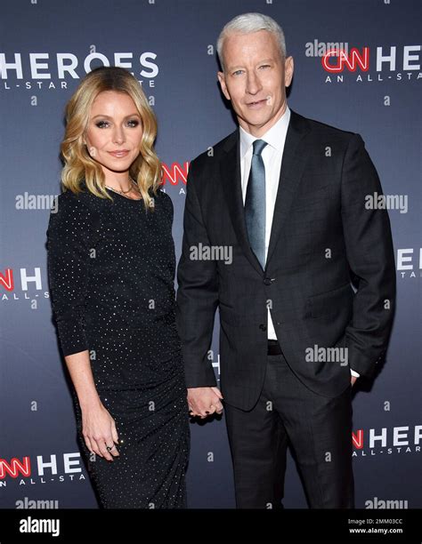 Co Hosts Kelly Ripa Left And Anderson Cooper Attend The 12th Annual