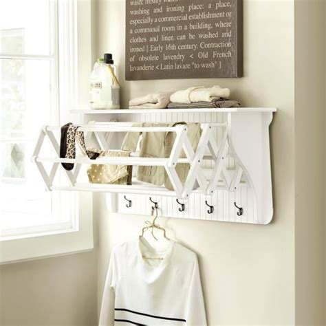 This laundry drying rack is 22w x 34h x 2.5d. Useful Wall Mounted Drying Rack - HomesFeed