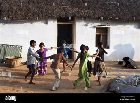 Indian Children Playing Games Outside A Rural Village Home Andhra