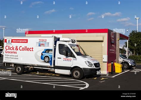Tesco Delivery Van At Click And Collect Point Stock Photo Alamy