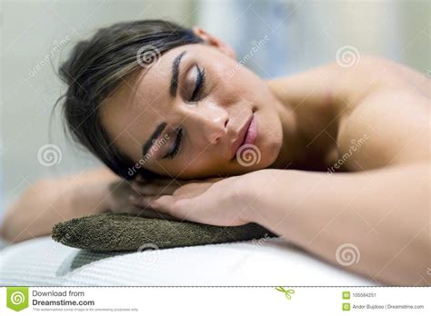 Beautiful Woman Lying On A Massage Table And Relaxing
