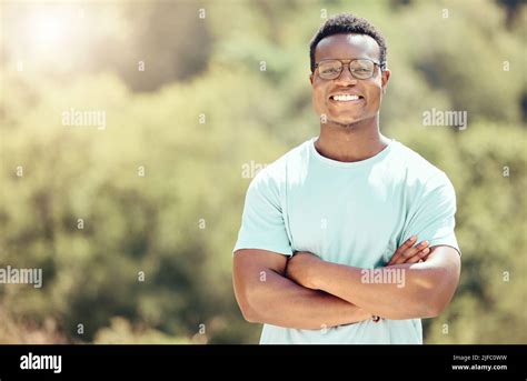 One Handsome Young African American Male Wearing Glasses And Standing
