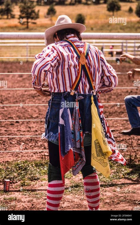A Professional Rodeo Clown Or Bullfighter In His Colorful Outfit At A