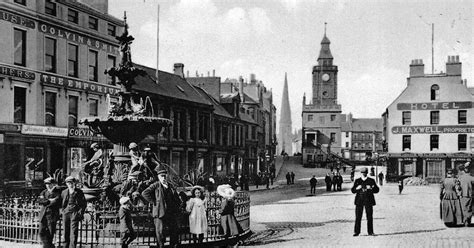 Old Photograph Of Scots By The Fountain On The High Street In Dumfries