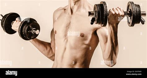 Man In Sports With Dumbbells Weak Man Lift A Weight Dumbbells Biceps