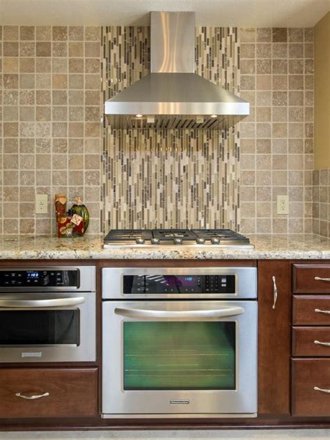 The area behind your stove tends to get the dirtiest, so it's a great space fill with a beautiful (and easily washable) tile. Photo Page | HGTV
