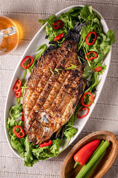 Grilled Whole Fish Stuffed With Herbs And Chilies Recipe