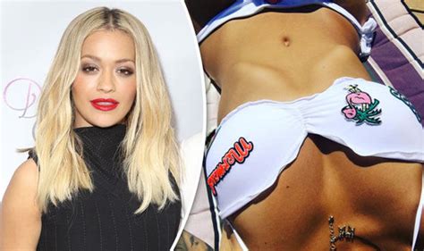 Rita Ora Flaunts Washboard Stomach And Cleavage In Steamy Snap