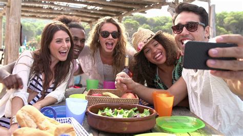 Group Of Friends Taking Selfie During Lunch Outdoors Stock Video
