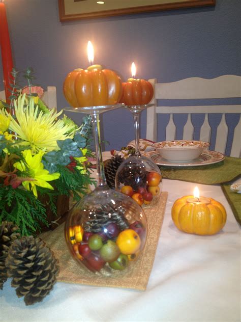 Pumpkin wine glasses make awesome autumn wine glass centerpieces, and while this project looks super impressive it's actually pretty simple and inexpensive! Wine Glass Candle Holder & Pumpkin Votives | Wine glass ...
