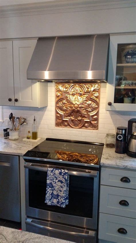You will need to identify the center tile so you can see how they. tin tile backsplash behind stove - Google Search | Tin tile backsplash, Tin tiles, Double wall oven