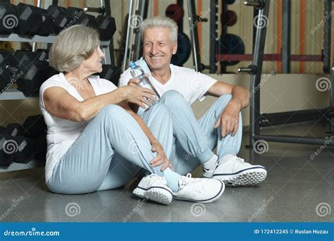 Portrait Of Senior Couple Drinking In Gym Stock Image Image Of Senior