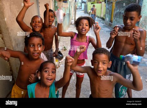 Children Cheering Happily In A Slum Or Favela Jacarezinho Favela Rio