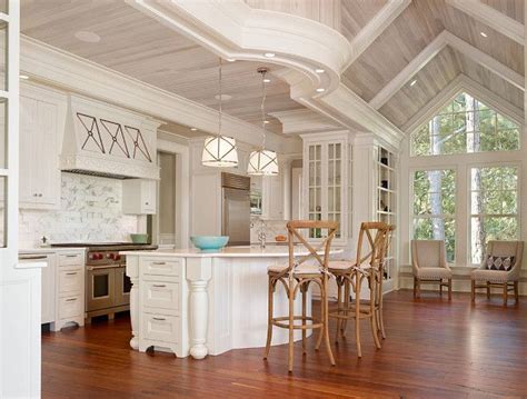 This kitchen has a simple, sweet and clean style that anyone could and would love in their home and it's finished off with beadboard cabinetry that gives the space a bit more depth and the backsplash and ceiling flow seamlessly together in this simple and contemporary kitchen space.{found on hgtv}. Kitchen Whitewashed Wood Ceiling. Kitchen features vaulted ...