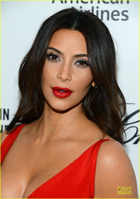 kim kardashian bares cleavage in red dress at elton john oscars party 2014 photo 3064085
