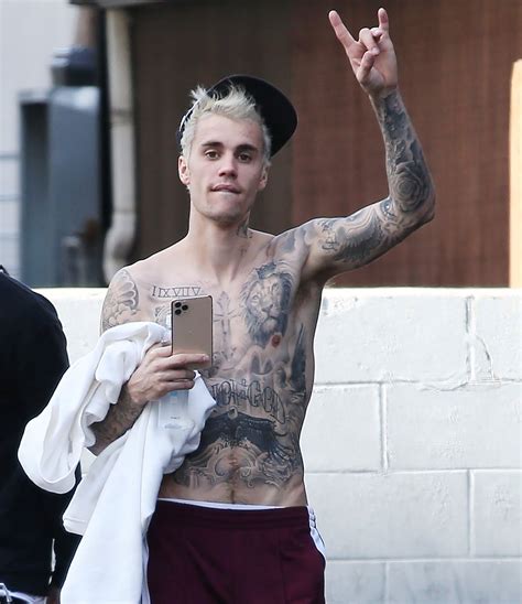 Justin Bieber Tattoo Tour Photos Meanings