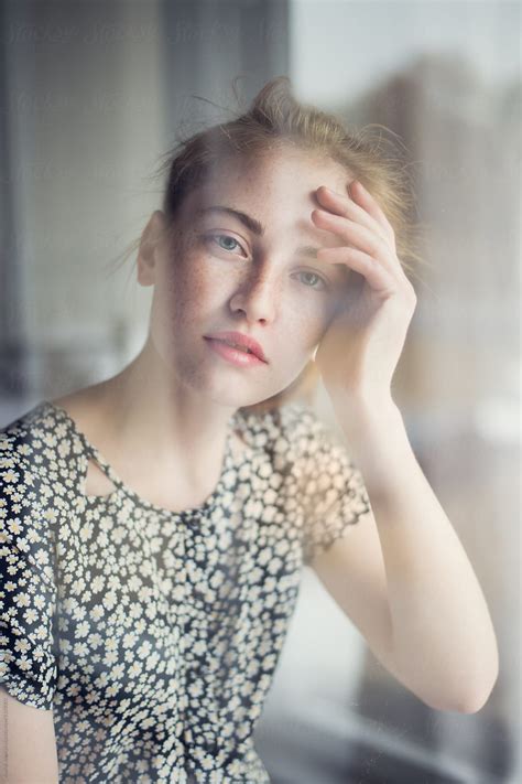 portrait of a beautiful girl with freckles for window glass by andrei aleshyn