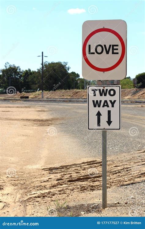 Black Red And White Love Two Way Street Sign With Arrows Stock Image