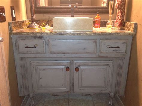 Light blue looks charming when it comes to a bathroom. Painted, glazed, distressed bathroom vanity. Started with ...