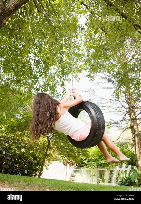Barefoot Girl On Tire Swing Hi Res Stock Photography And Images Alamy