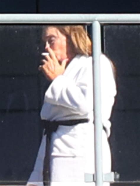 Caitlyn Jenner Spotted Flicking Her Cigarette Of A Balcony While In Hotel Quarantine In Sydney