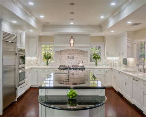 Soffits (dropped ceilings) found over kitchen cabinets or sometimes running along hallways or room ceilings install the air barrier for the ceiling and side walls of the soffit on the inside of the framing. Atherton Family Kitchen - Traditional - Kitchen - san ...