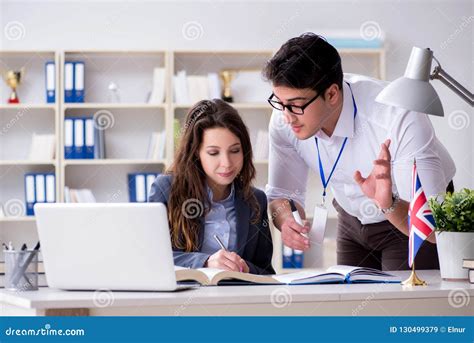 The Teacher Explaining To Student At Language Training Stock Image