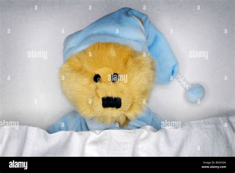 Teddy Bear In A Bed Stock Photo Alamy