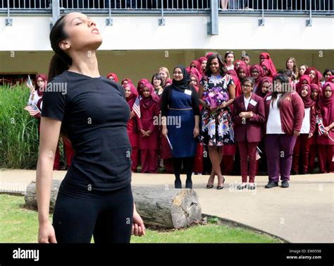 Us First Lady Michelle Obama Is Greeted By Students During A Visit To