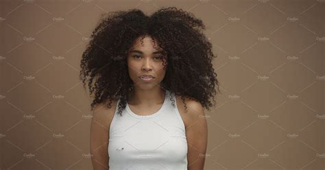 Mixed Race Black Woman Portrait With Big Afro Hair Curly Hair Featuring High Quality People