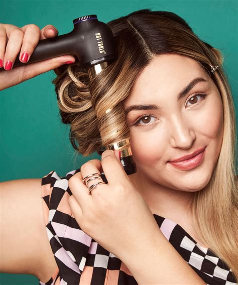 Then, wrap your hair in a little roll exactly where your undercut starts on the other side and set it with a bobby pin or two. You Won't Believe What This Weird New Curling Iron Can Do ...