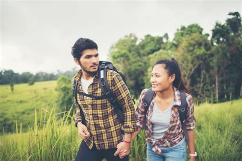 Free Photo Portrait Of Happy Young Couple Walking Having Fun On Their