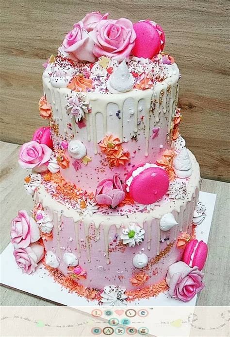 Check out our engagement ceremony selection for the very best in unique or custom, handmade pieces from our gifts for the couple shops. 2-tier drip engagement cake with macrons and fresh flowers ...