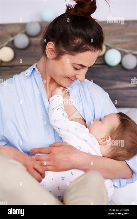 Mother Breastfeeding Her Baby Stock Photo Alamy