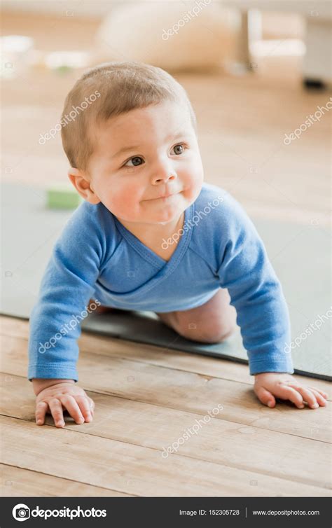 Baby Boy Crawling On Yoga Mat Stock Photo By ©natashafedorova 152305728