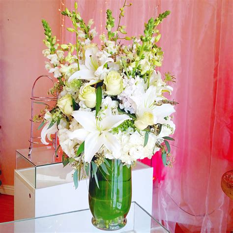 White Blooming Elegance In Downey Ca Chitas Floral Designs