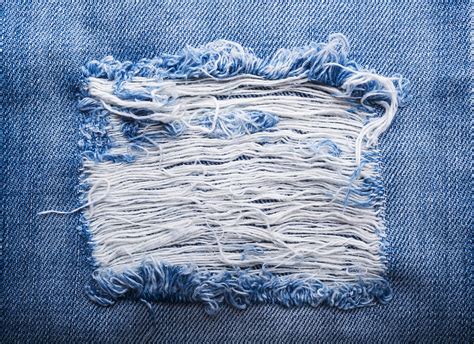 Blue Torn Denim Jeans Texture Photograph By Julien