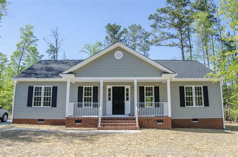 Beautiful Ranch Style Customhome With A Front Porch And An A Roof