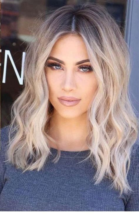 A fierce winged eyeliner and a bold lip will complement this hairstyle! Medium blonde hair style - StepUpLadies.net | Ombre hair ...