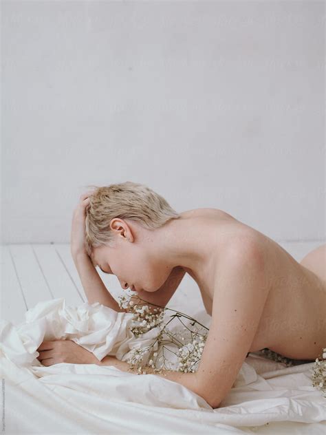 Nude With Flowers By Stocksy Contributor Serge Filimonov Stocksy