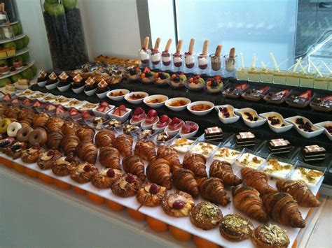 An Assortment Of Pastries And Desserts On Display