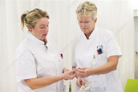 Nurses Checking Medication Stock Image C0491148 Science Photo