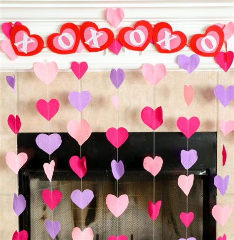 It's also easier if you cut off a piece of tape to work with rather than just pulling tape directly from the roll. DIY It - Crepe Paper Heart Decorations - A Kailo Chic Life