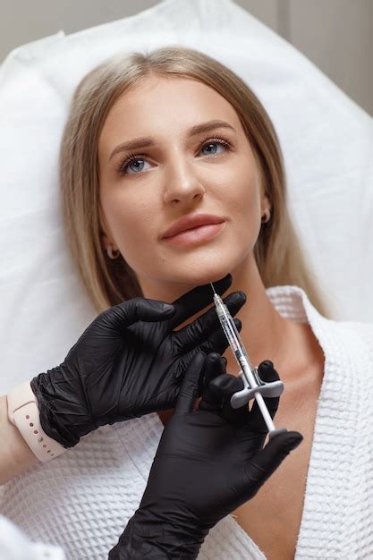 Premium Photo Beautician Making Injection In Woman S Face Closeup Biorevitalization